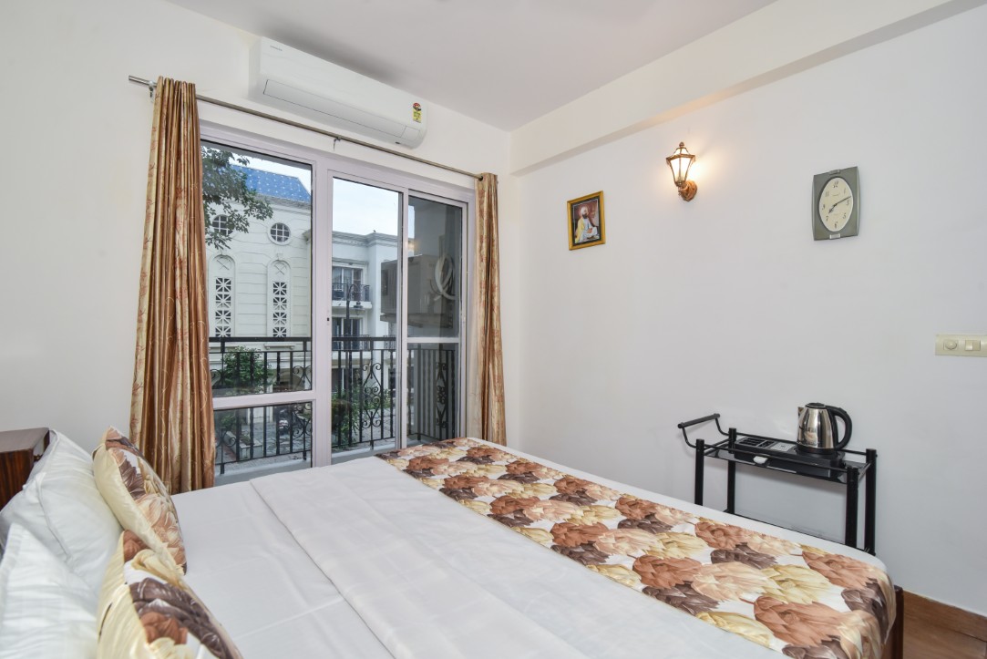 A bedroom in the 3 BHK